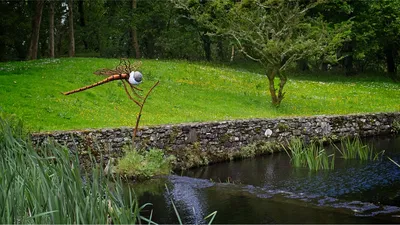 Metal firefly sculpture photograph
